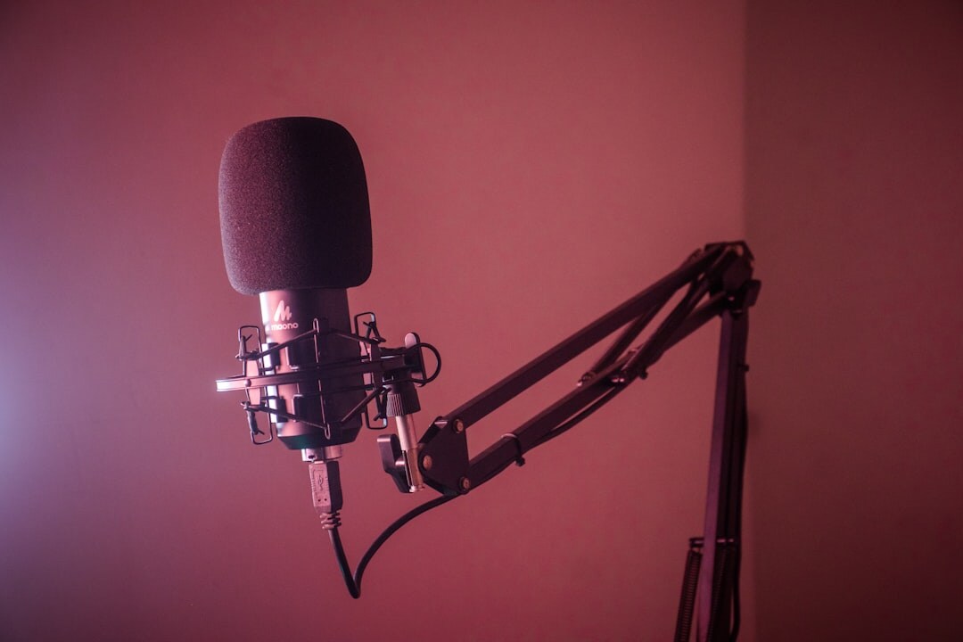 podcast host behind microphone
