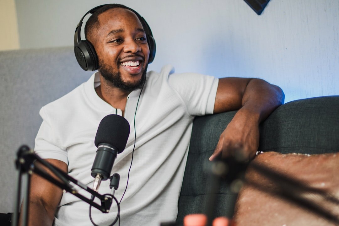 podcast host behind microphone