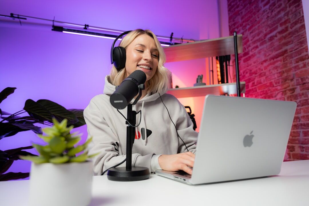Two people recording a conversation for a podcast episode in a studio